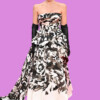 Elegant fashion dress with floral pattern, strapless design, and black gloves, model posing against a purple background. bla bla.