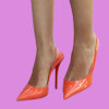 Elegant orange high heels on a person's feet, bla bla.