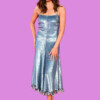 A woman in a shiny blue dress at the London Film Festival, bla bla.